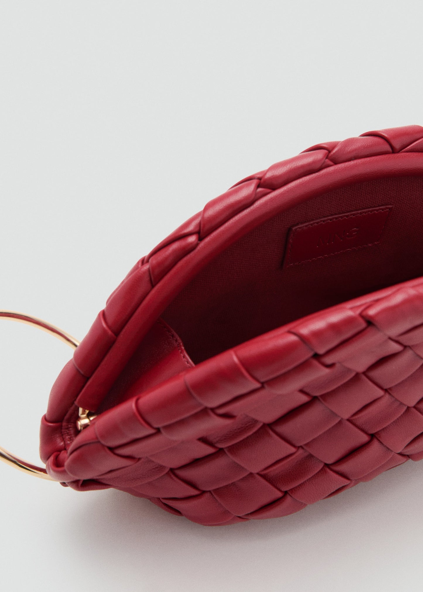 Braided leather clutch bag
