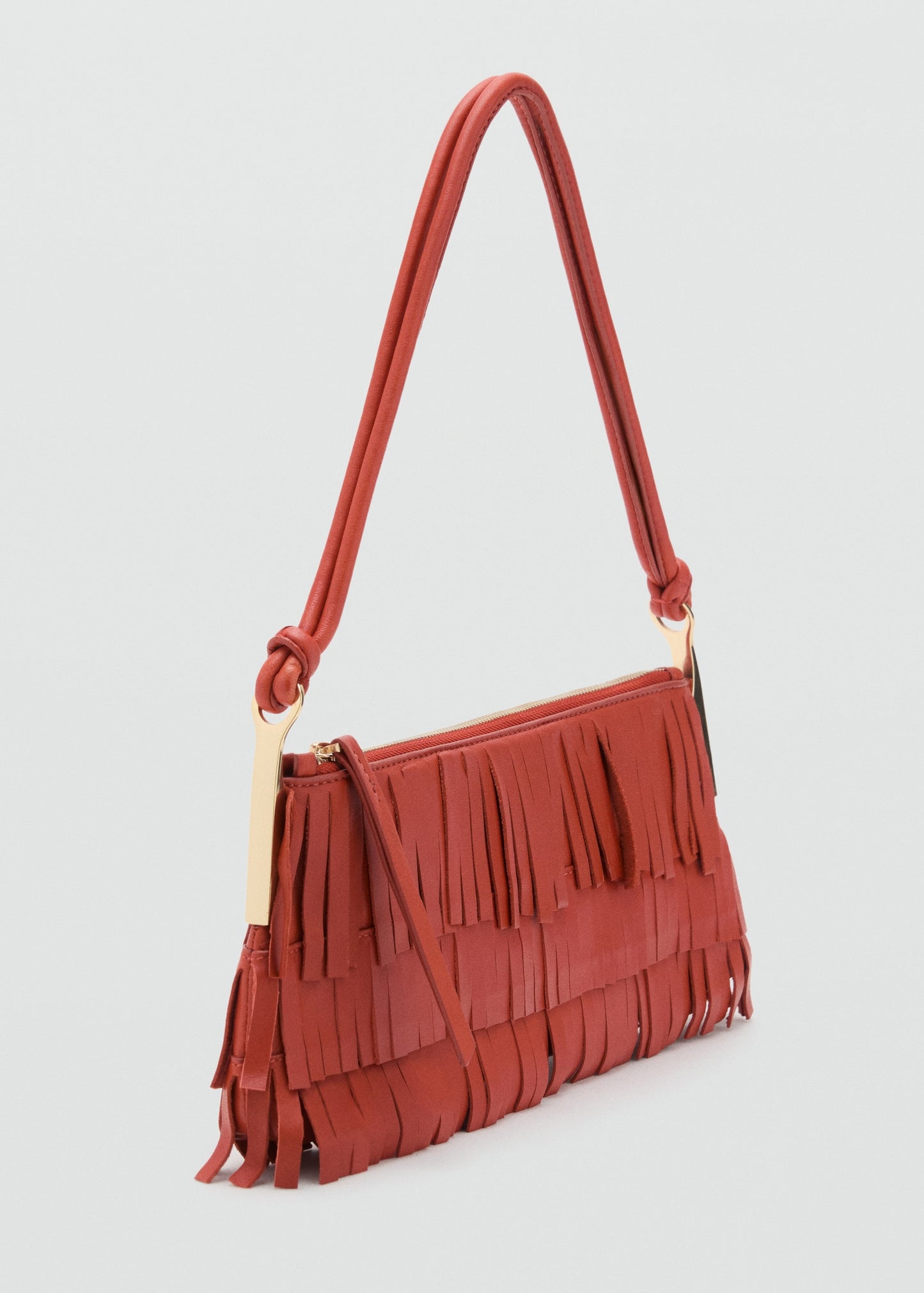 Leather shoulder bag with fringes