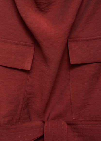 Blouse with draped neck and belt