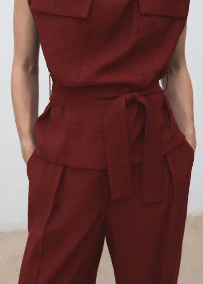 Blouse with draped neck and belt