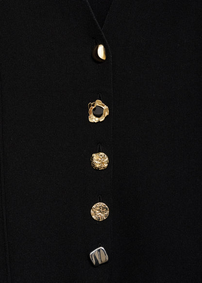Knitted jacket with jewel buttons