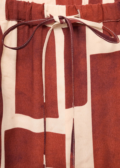 Fluid trousers with geometric pattern