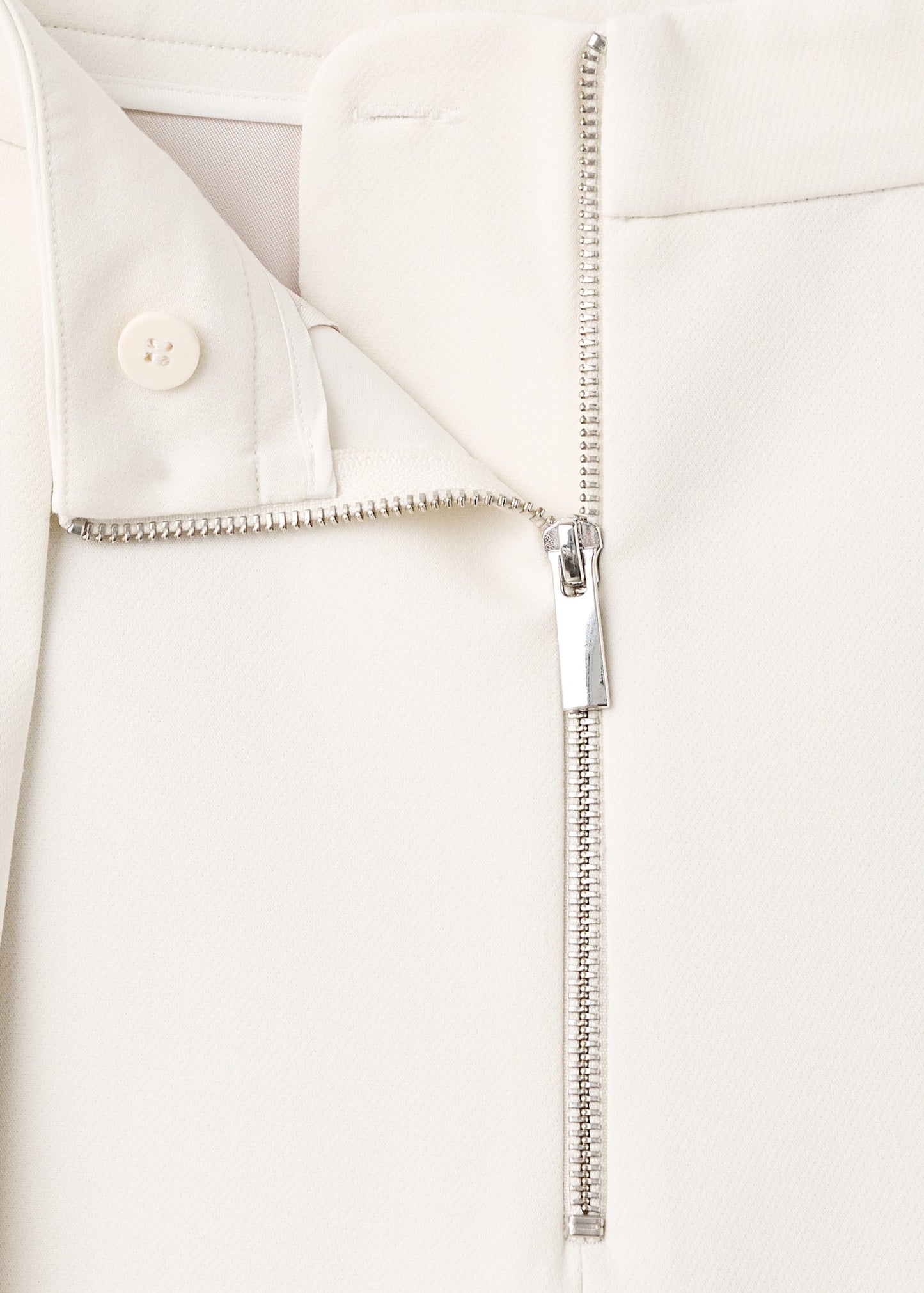 Pleated trousers with zip