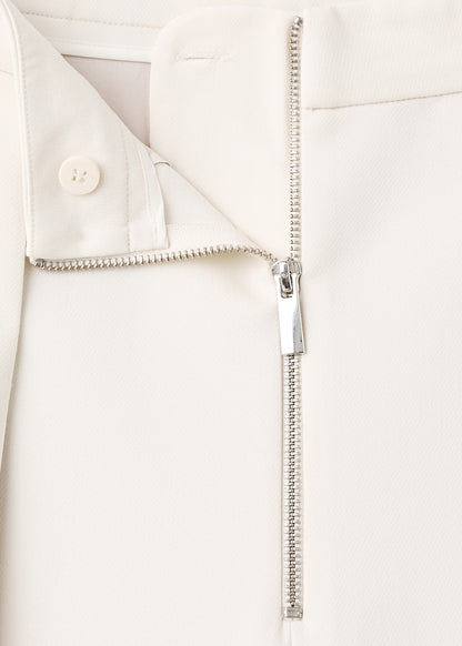 Pleated trousers with zip
