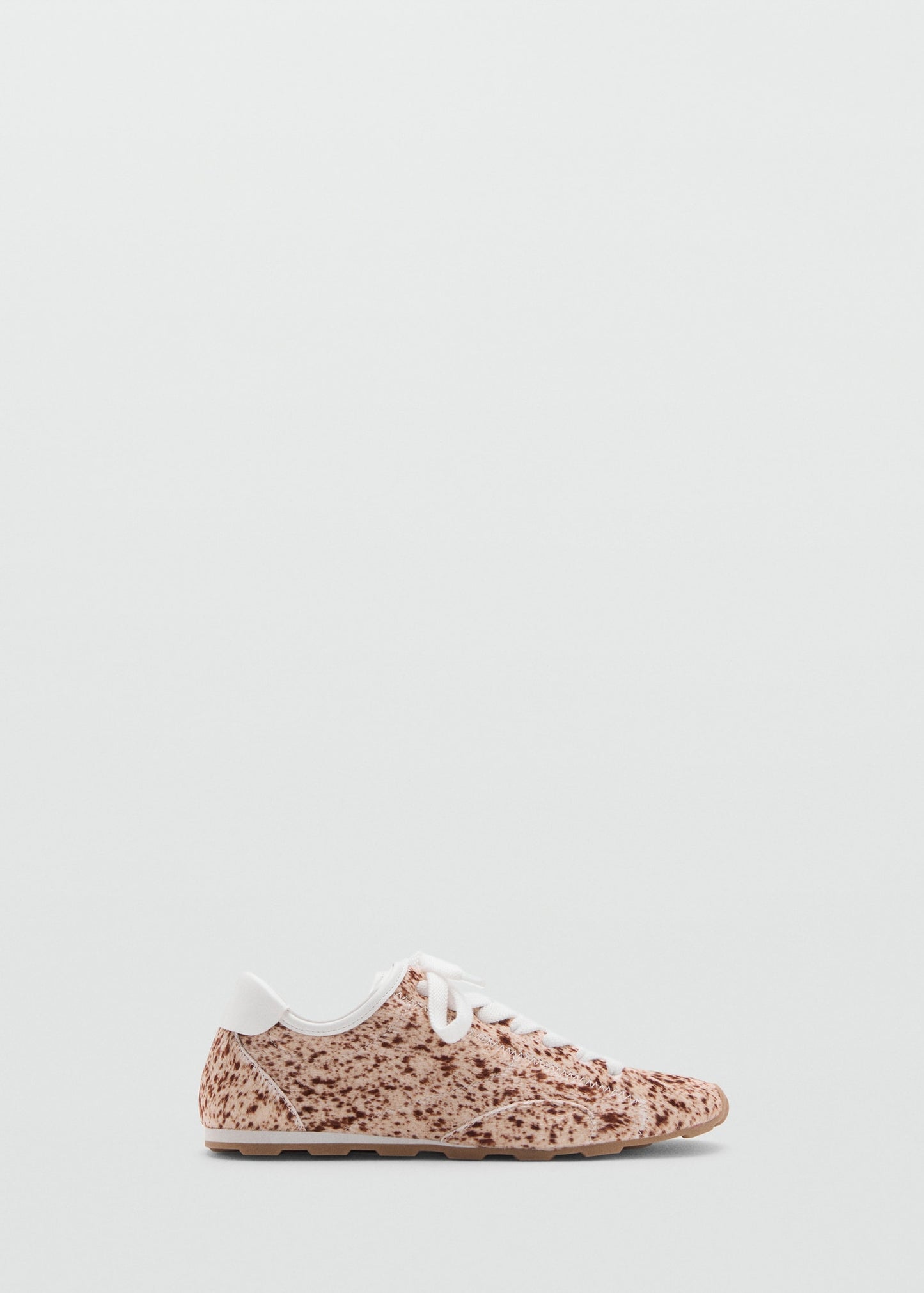 Leather and fur-effect trainers