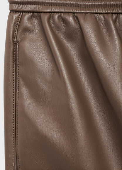 Leather-effect elastic waist trousers