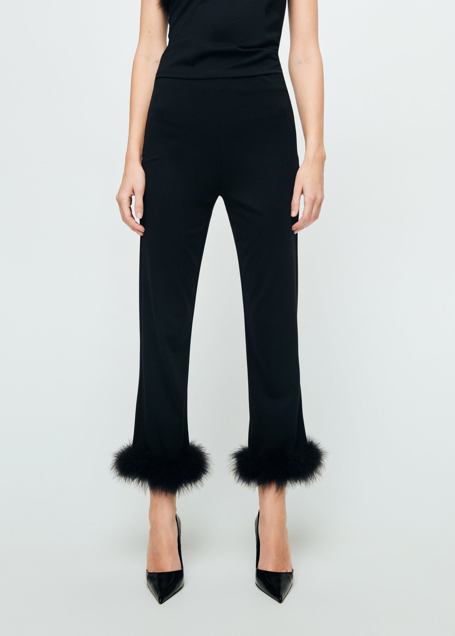 Capri trousers with feathers