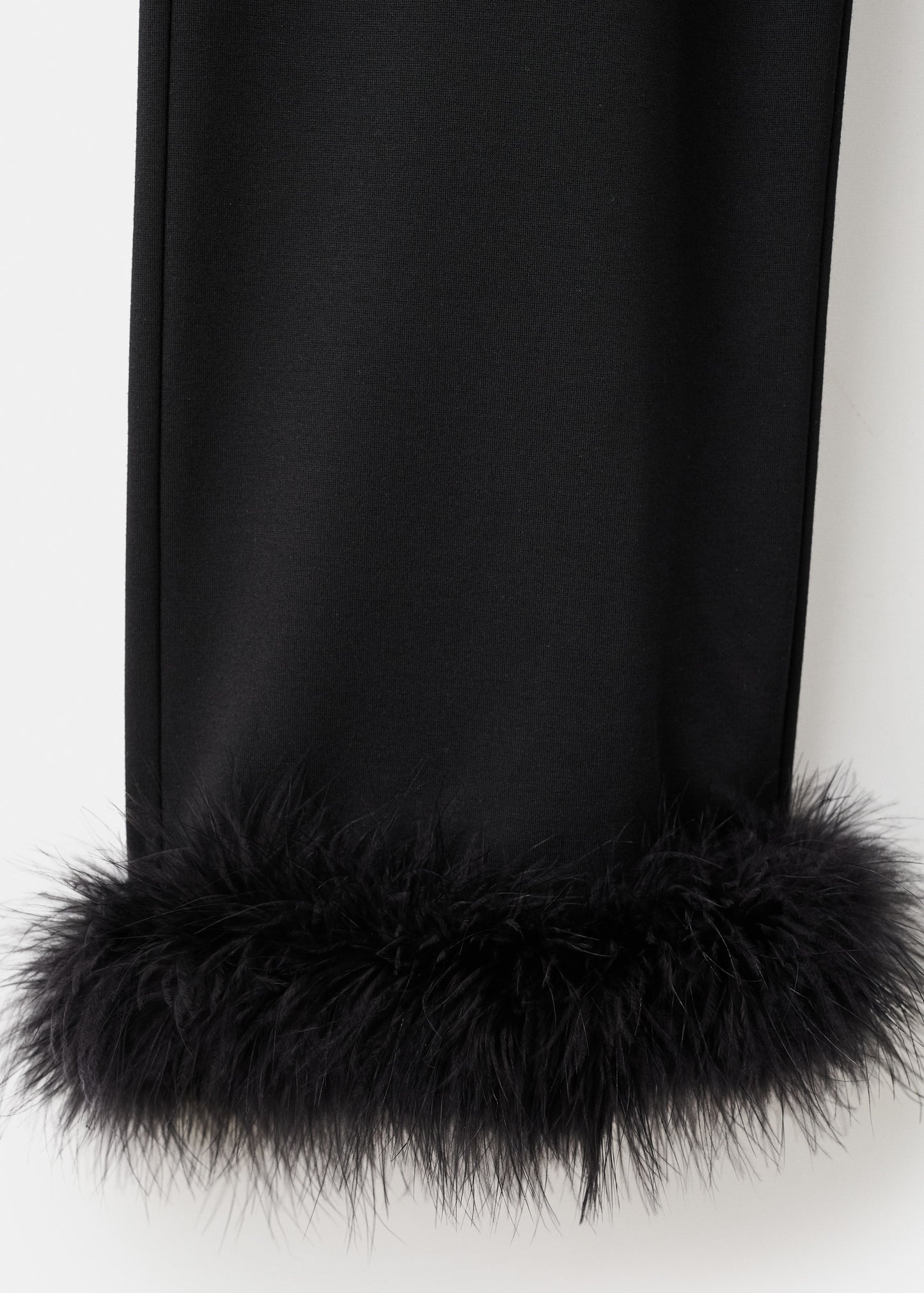 Capri trousers with feathers