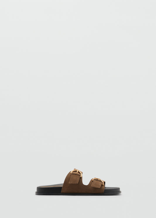 Flat leather sandal with buckles