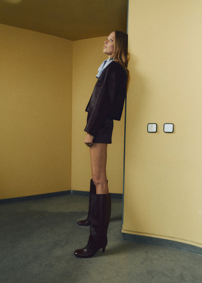 Leather jacket with fur pockets