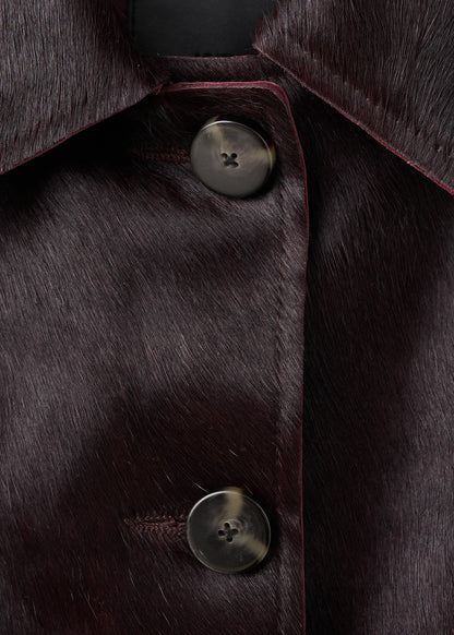 Leather jacket with fur pockets