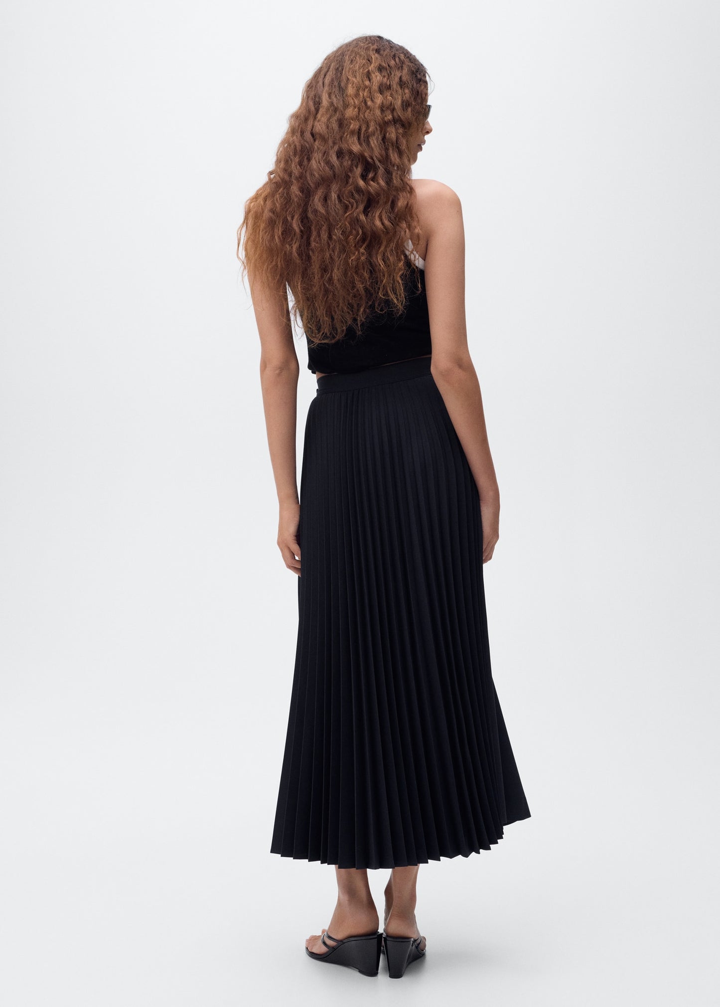 Pleated crossover skirt