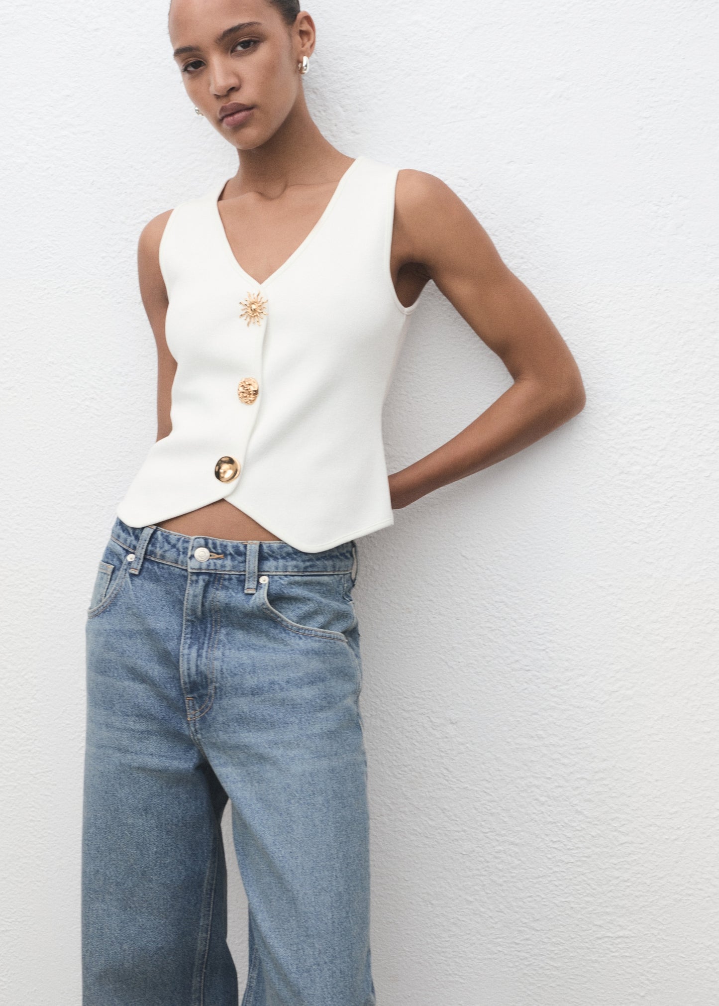 Knitted waistcoat with jewel buttons