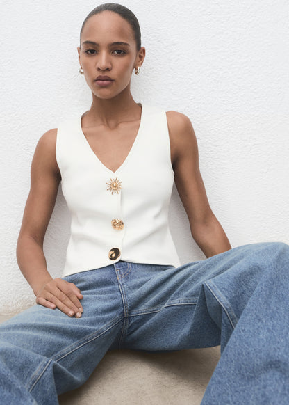 Knitted waistcoat with jewel buttons