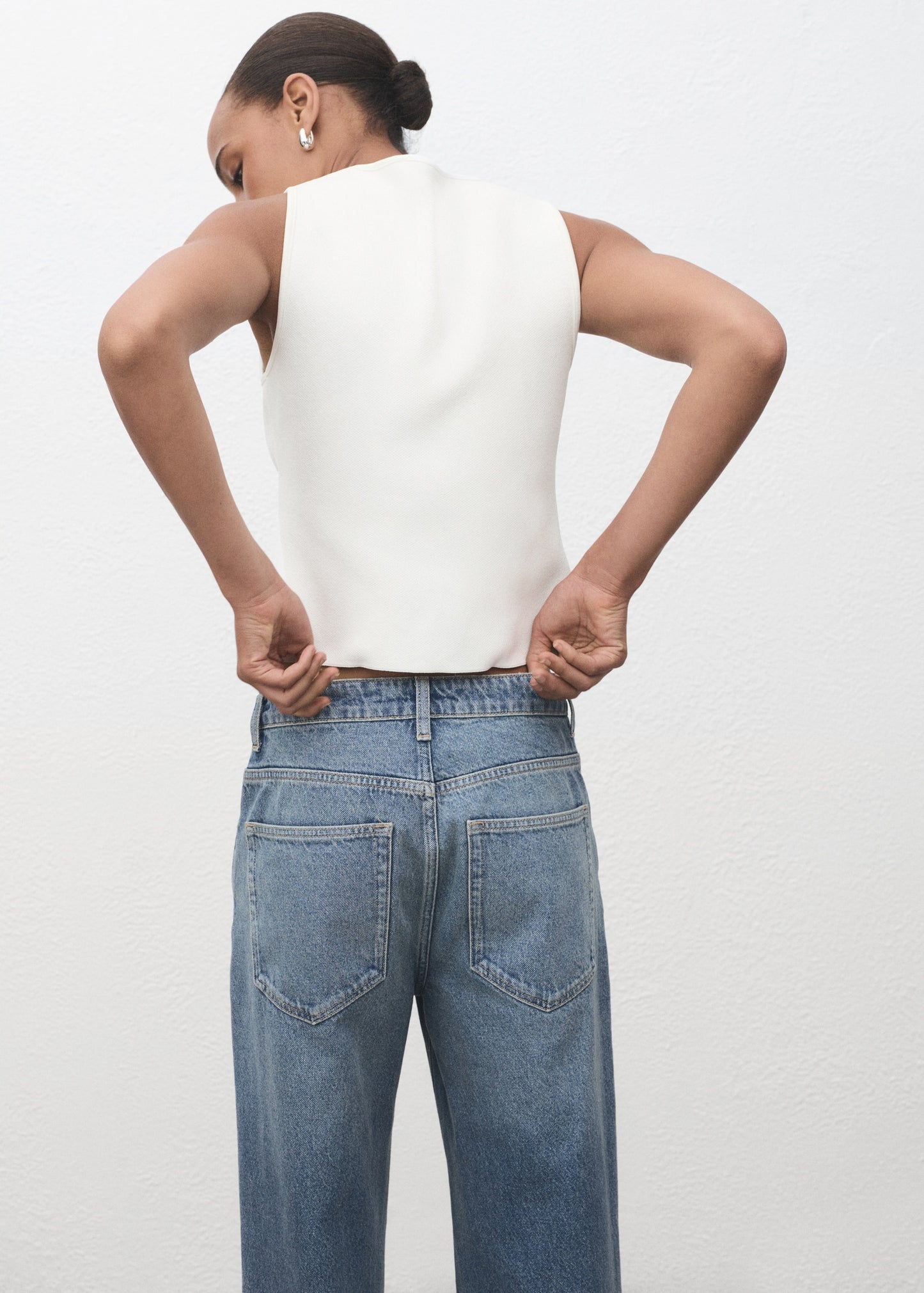 Knitted waistcoat with jewel buttons