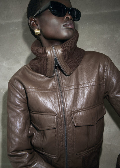 Leather-effect roll-neck jacket