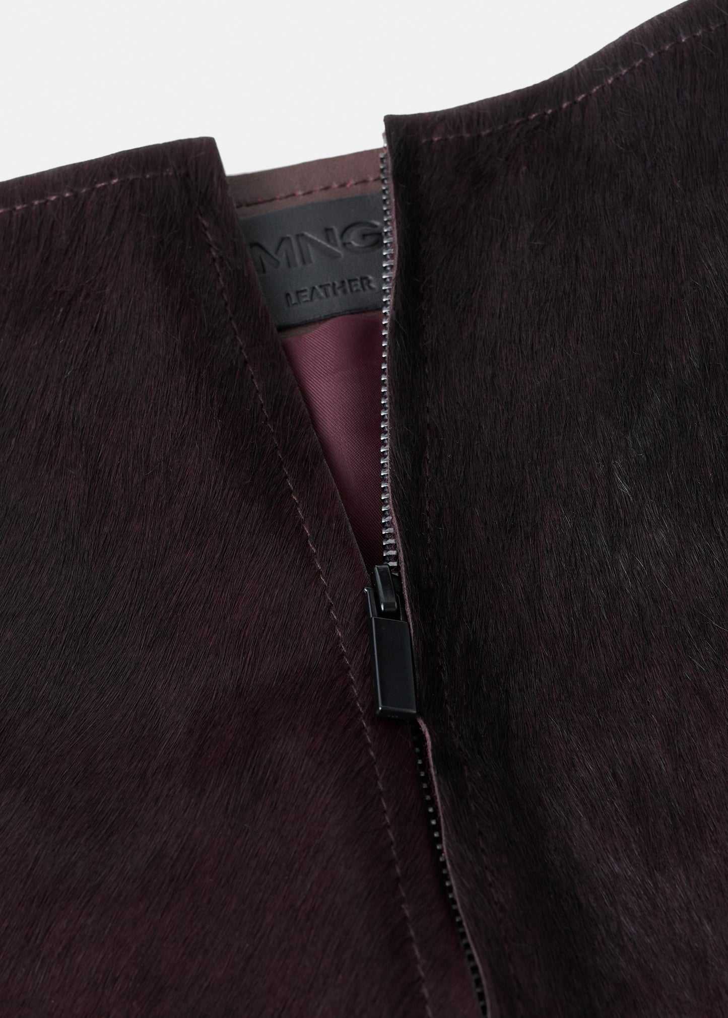 Leather and fur-effect mini-skirt
