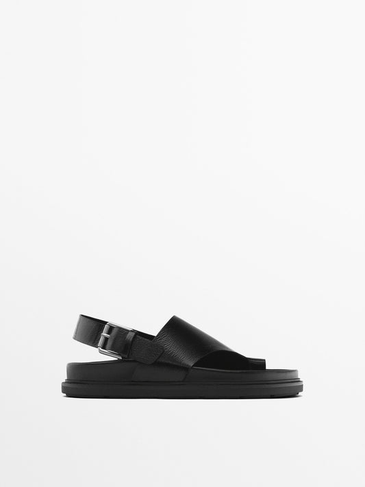 Asymmetric flat sandals