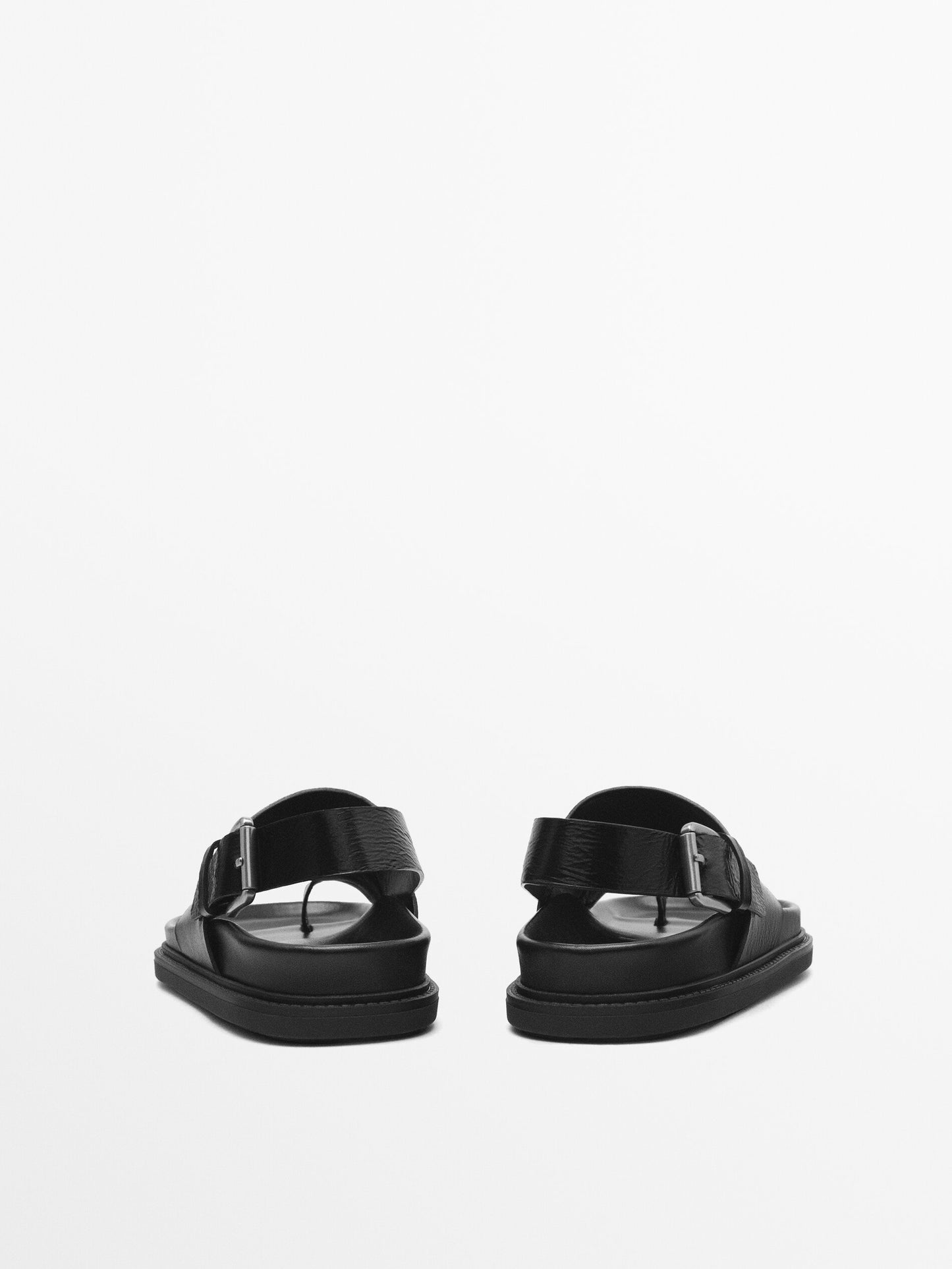 Asymmetric flat sandals