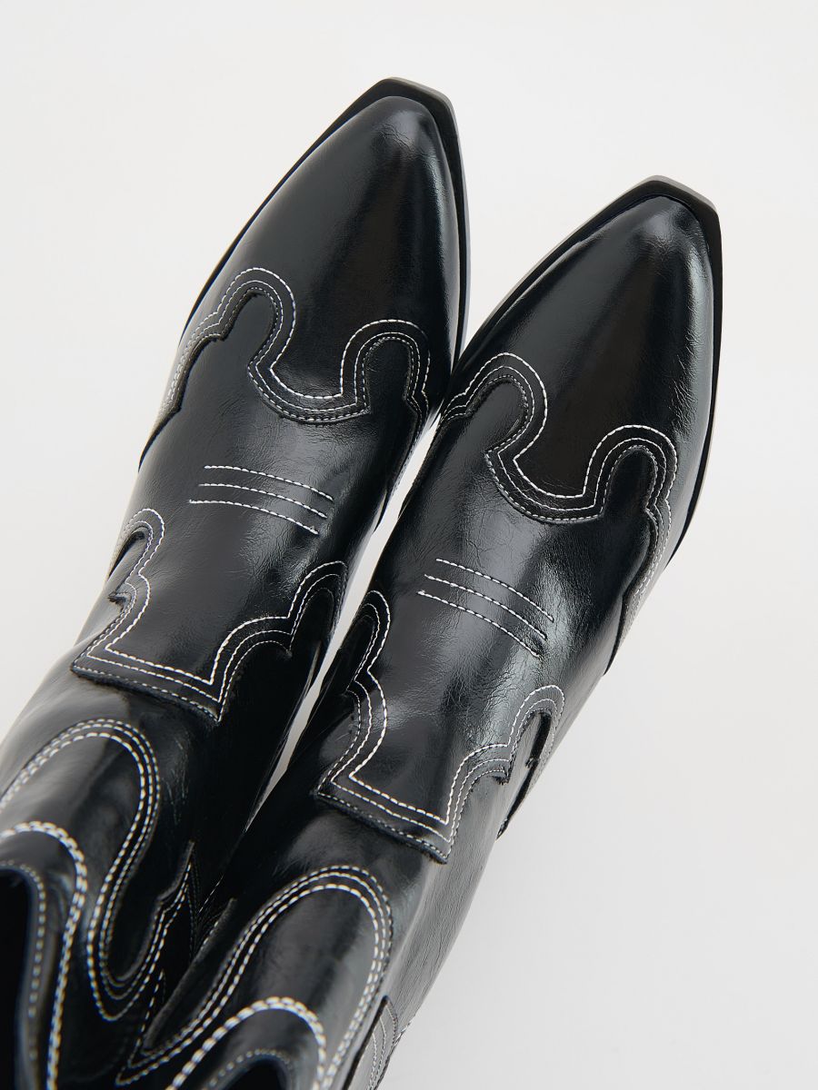 Cowboy ankle boots with stitching