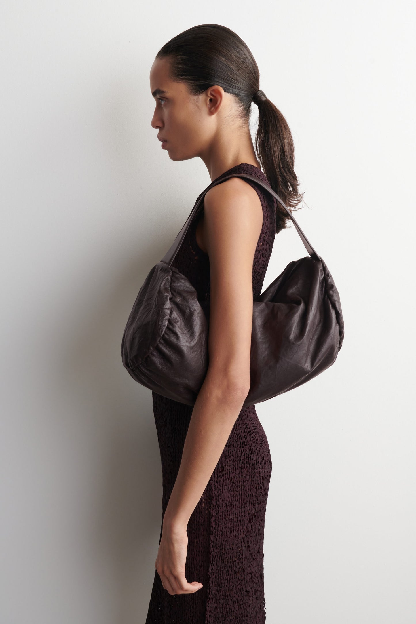 Textured-Leather Cylinder Clutch Bag