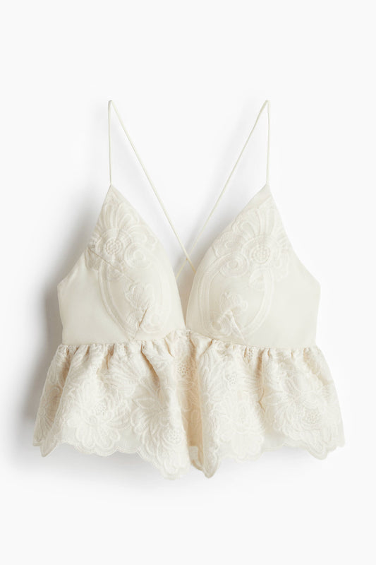 Embroidered peplum top