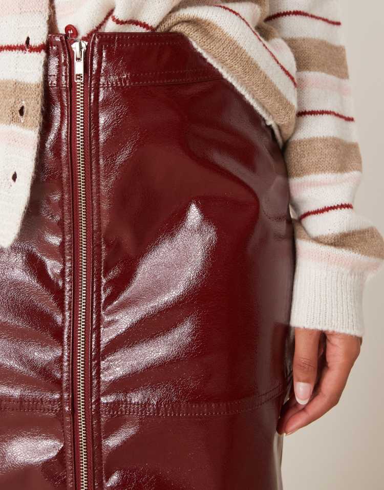 Zip front high shine leather look midi skirt in burgundy