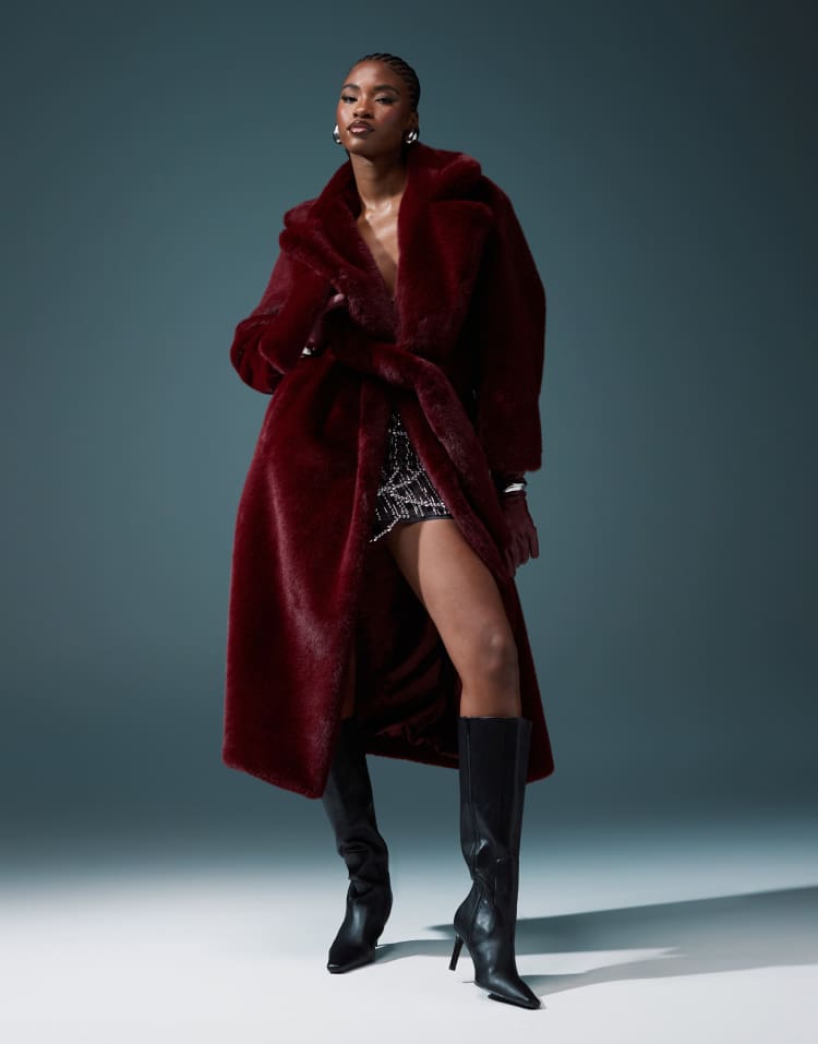 Longline belted faux fur coat in burgundy