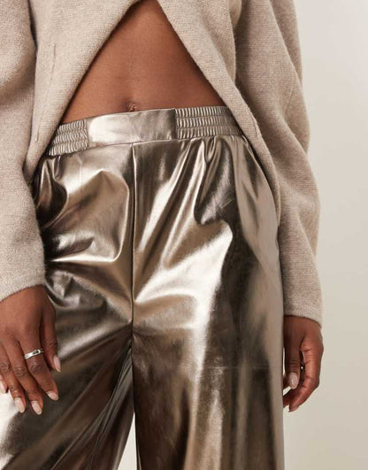 Faux leather pull on barrel trousers in brass