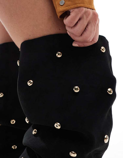 Karma studded heeled over the knee boots in black