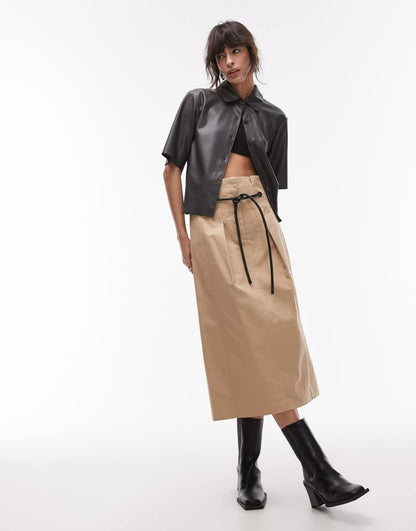 Deconstructed high waist belted skirt in stone