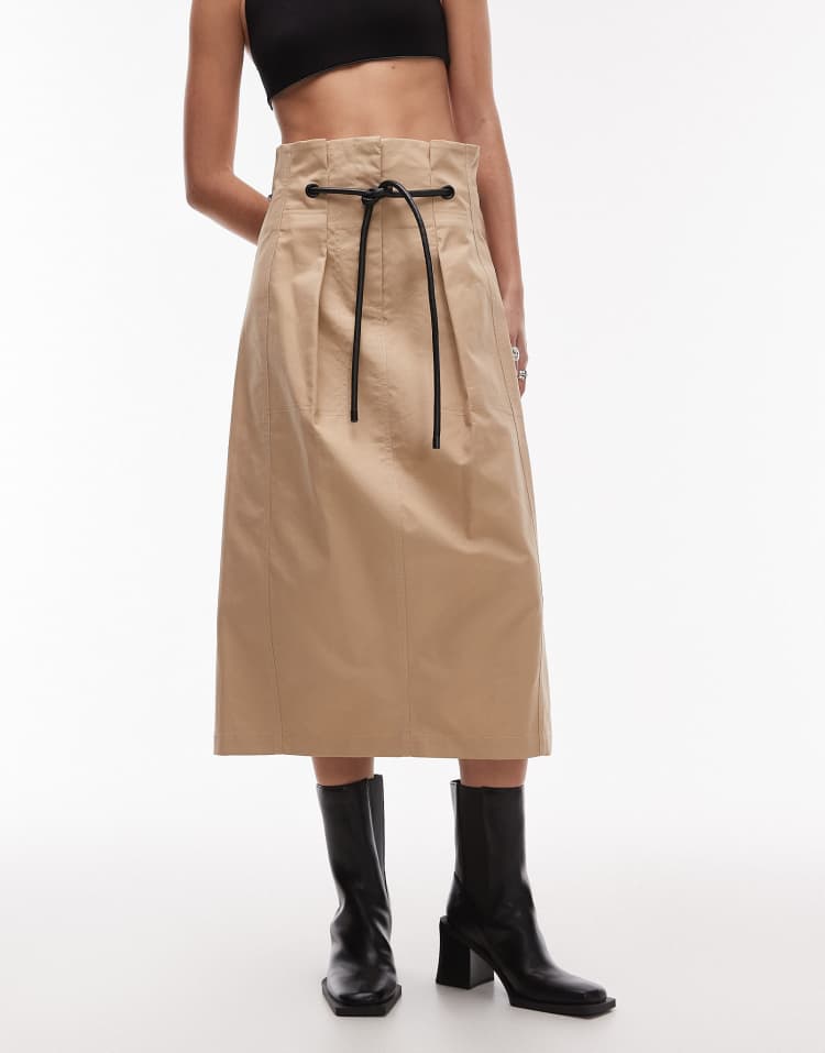 Deconstructed high waist belted skirt in stone