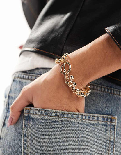 Multirow bracelet with chunky chain t bar detail in gold tone