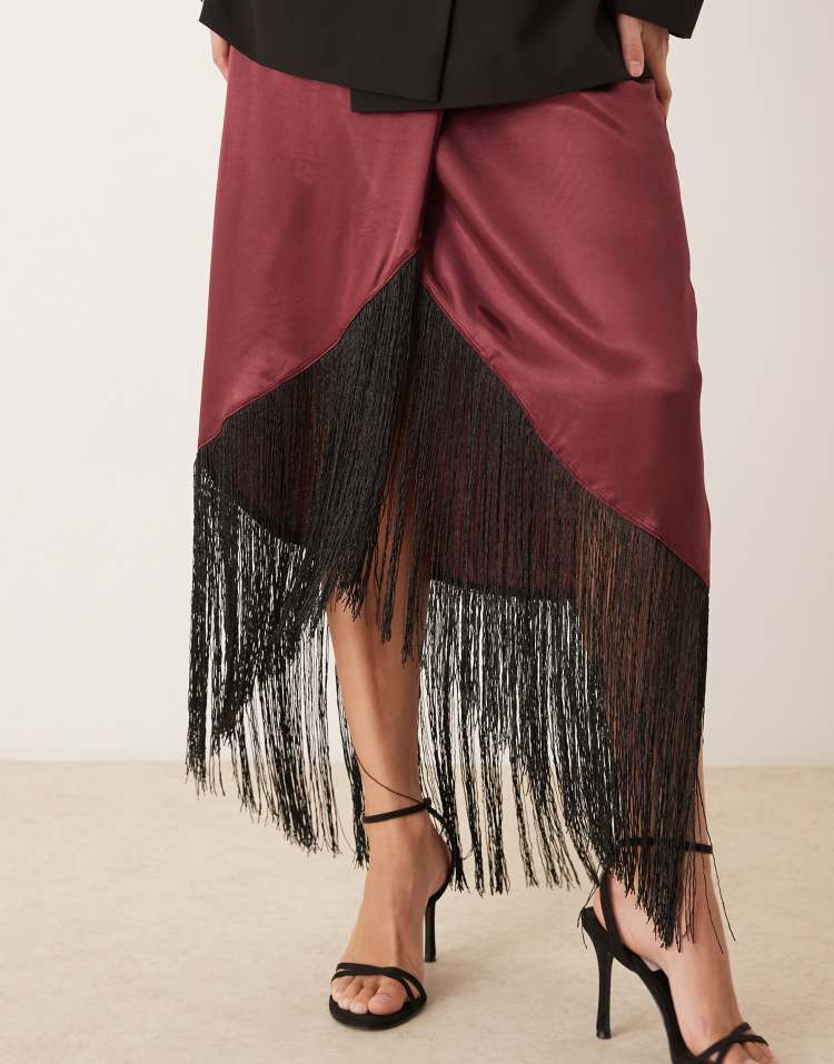 Satin wrap skirt with fringe hem in burgundy