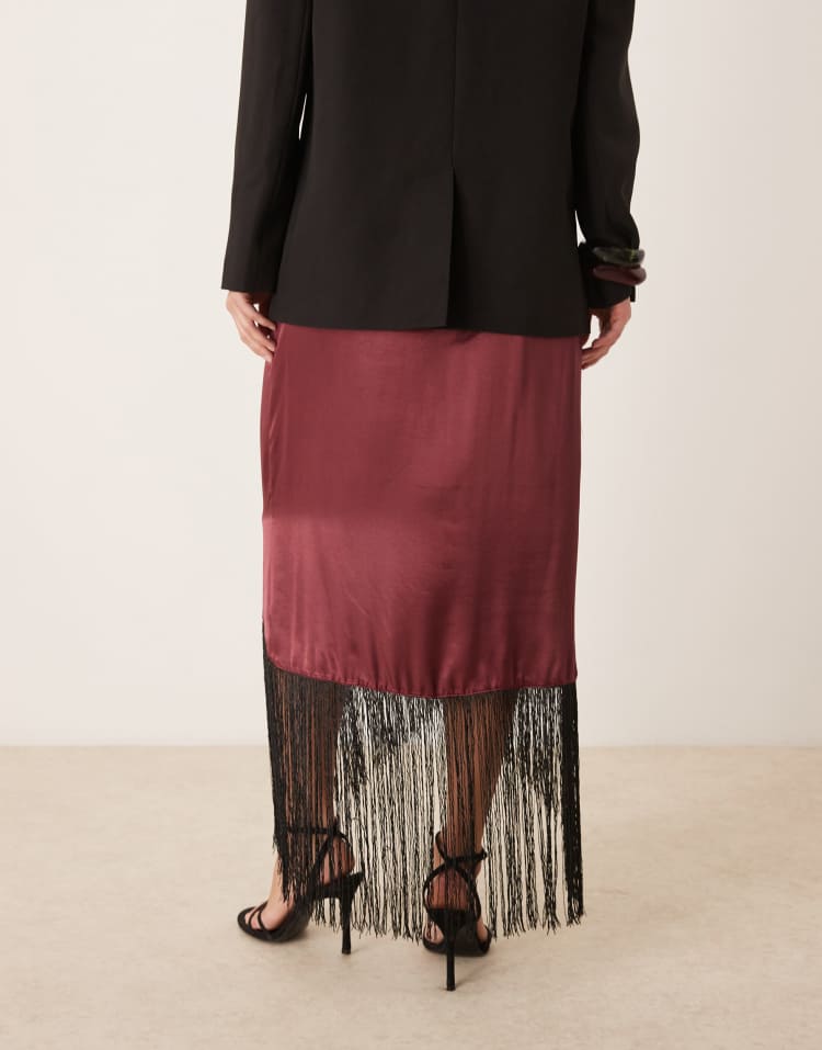 Satin wrap skirt with fringe hem in burgundy