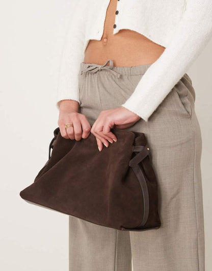 Suede belted crossover clutch bag in brown