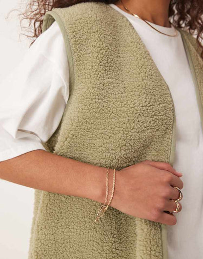 Borg gilet with binding in sage green