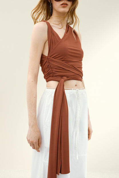 Asymmetric wrap top