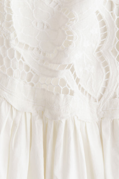 Embroidered linen-blend dress