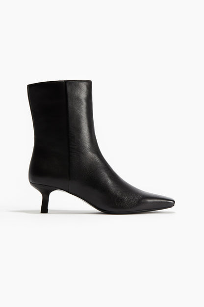 Heeled leather boots