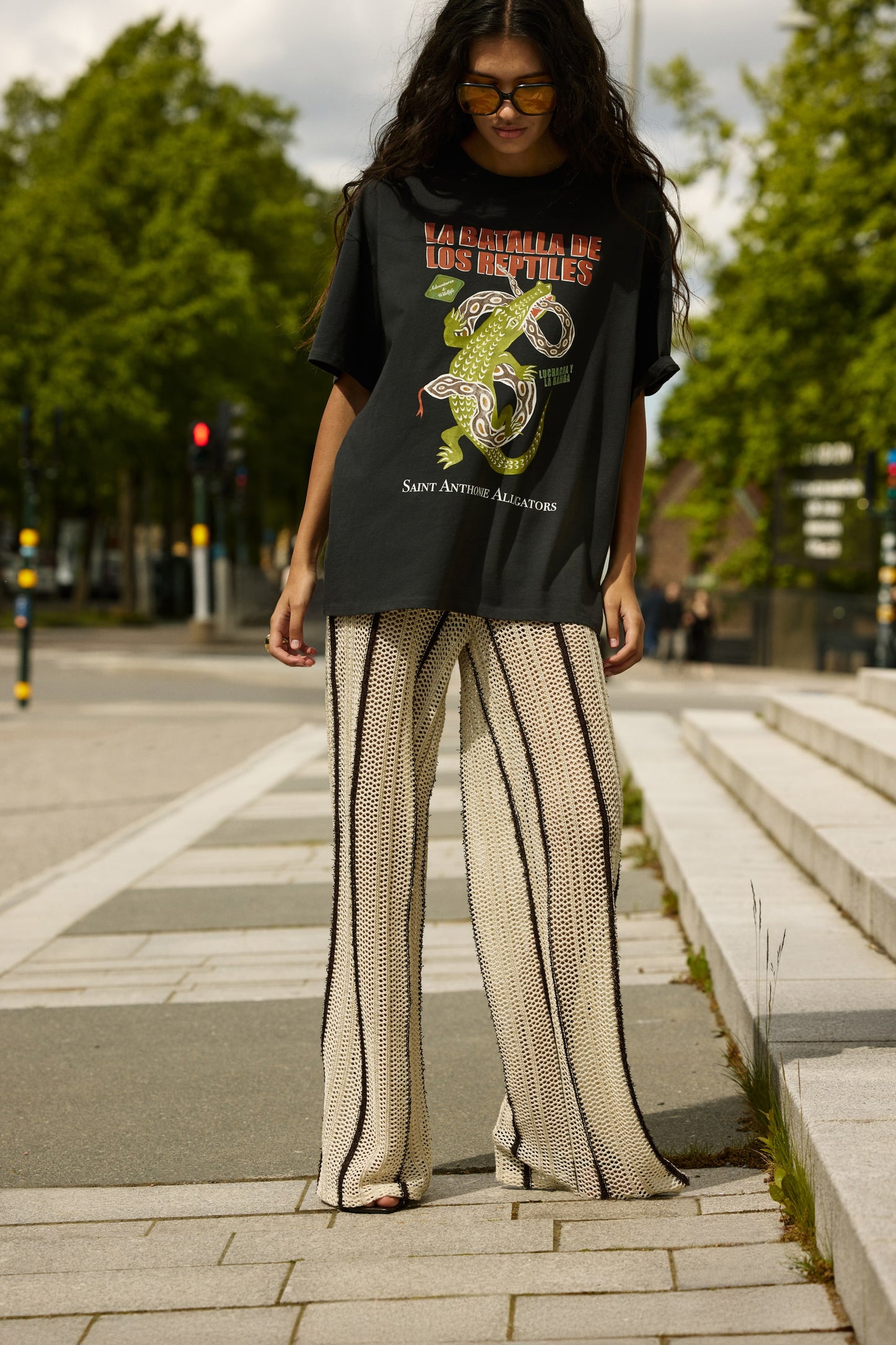 Shimmering hole-knit trousers