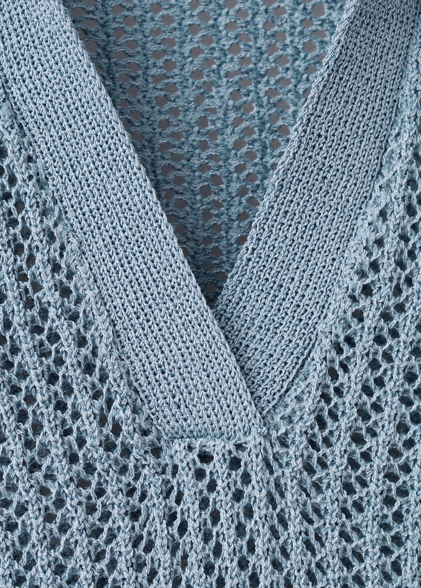 Openwork knitted polo-neck sweater