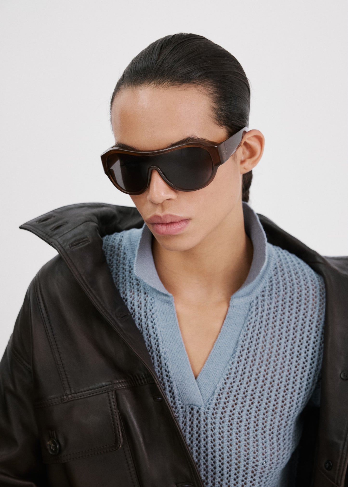 Openwork knitted polo-neck sweater