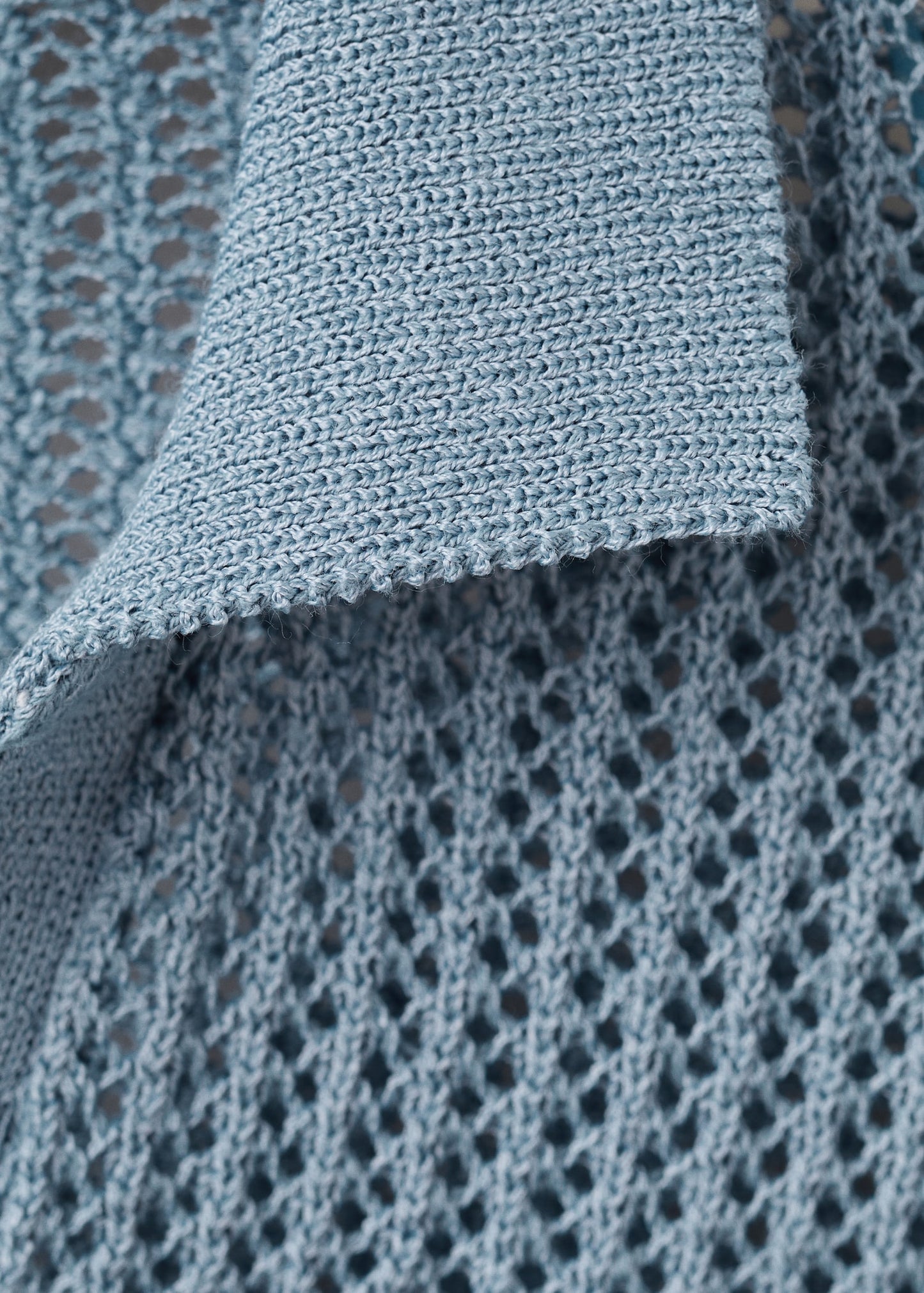Openwork knitted polo-neck sweater