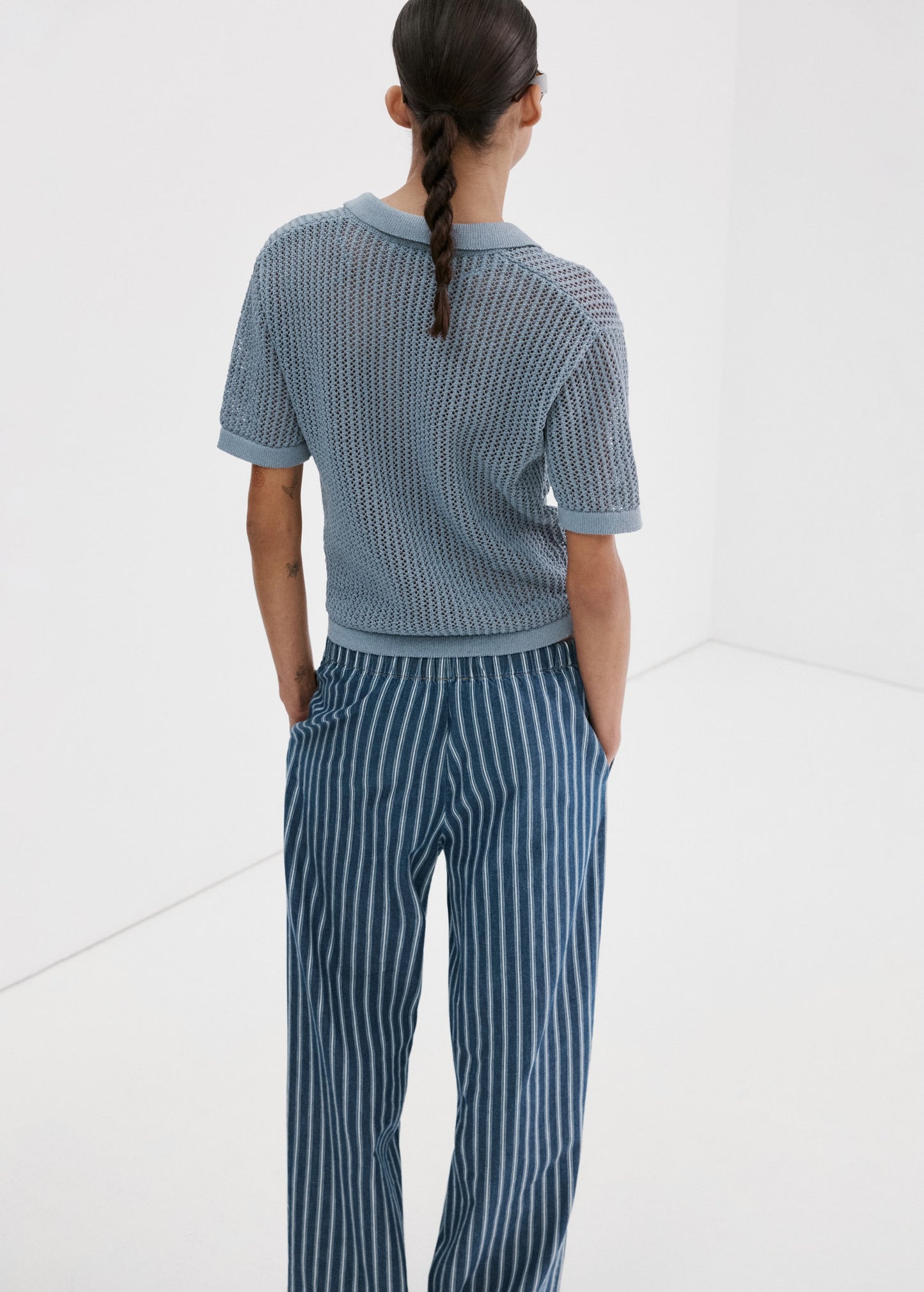 Openwork knitted polo-neck sweater