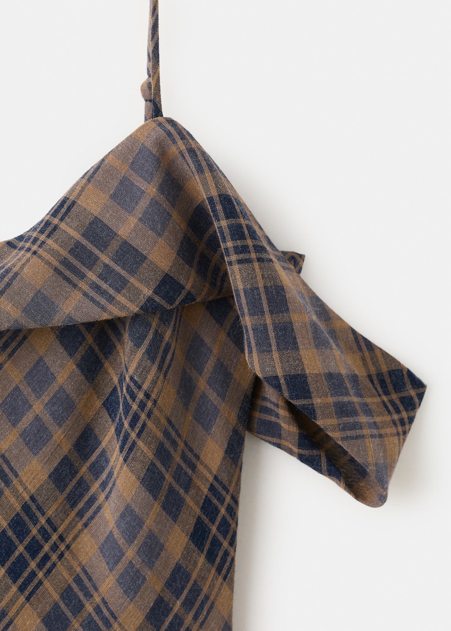 Check asymmetrical dress