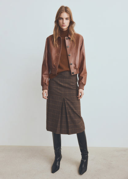 Sweater with buttoned cuffs and perkins collar