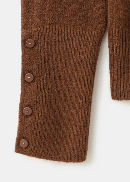 Sweater with buttoned cuffs and perkins collar