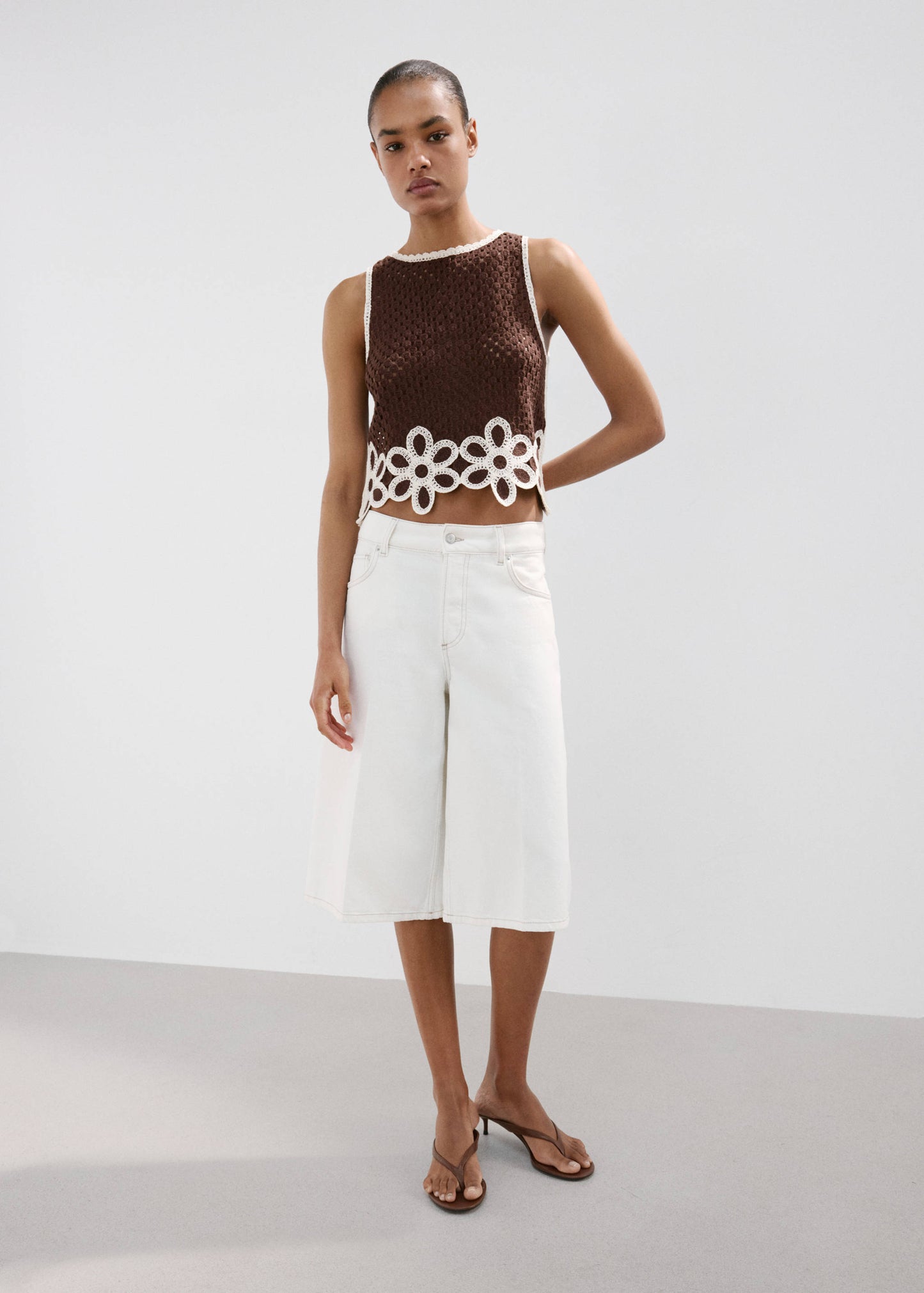 Floral-embroidered crochet top