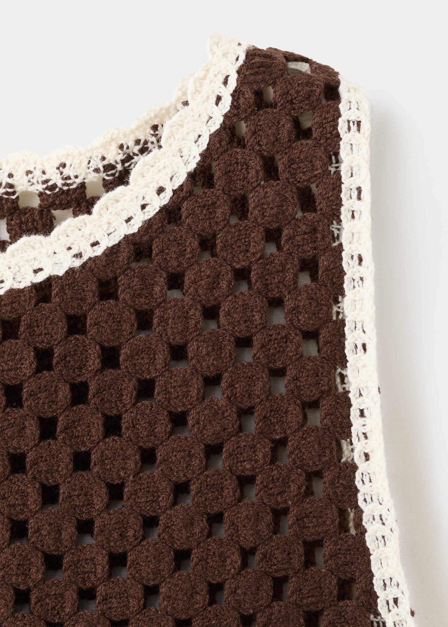 Floral-embroidered crochet top